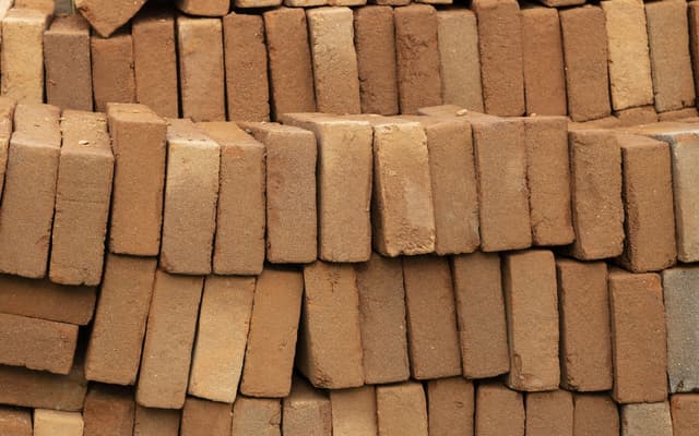 Block de barro rojo recocido, entrega en obra